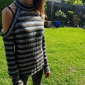 Ribbed, cold shoulder, long sleeve top.